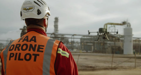 Professional enterprise drone pilot operating DJI equipment in the field