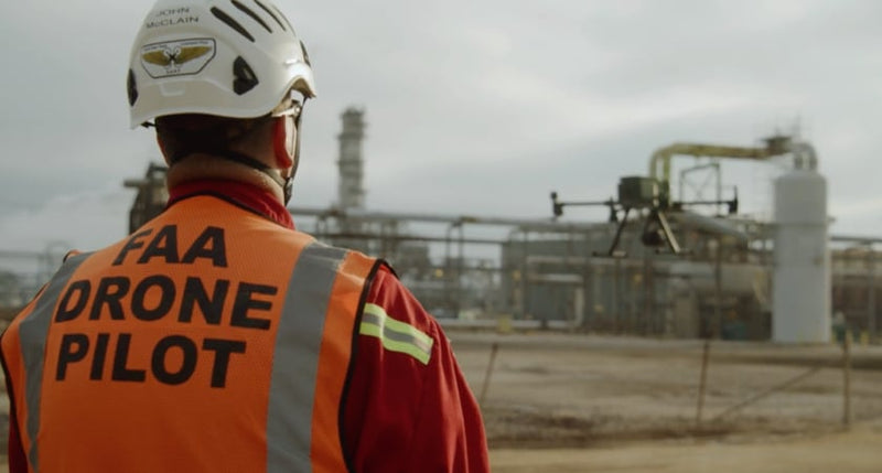 Professional enterprise drone pilot operating DJI equipment in the field